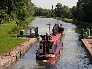 Rosie and Temujin leaving the lock at Frise Rosie and Temujin leaving the lock at Frise