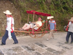 Carrying the Laughing Buddah up to Ping An