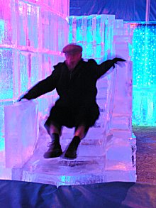 Norman Veit playing on the ice slide