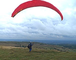 Para gliding from the summit.