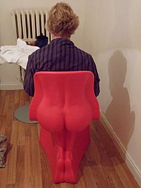 Sue in pink chair.